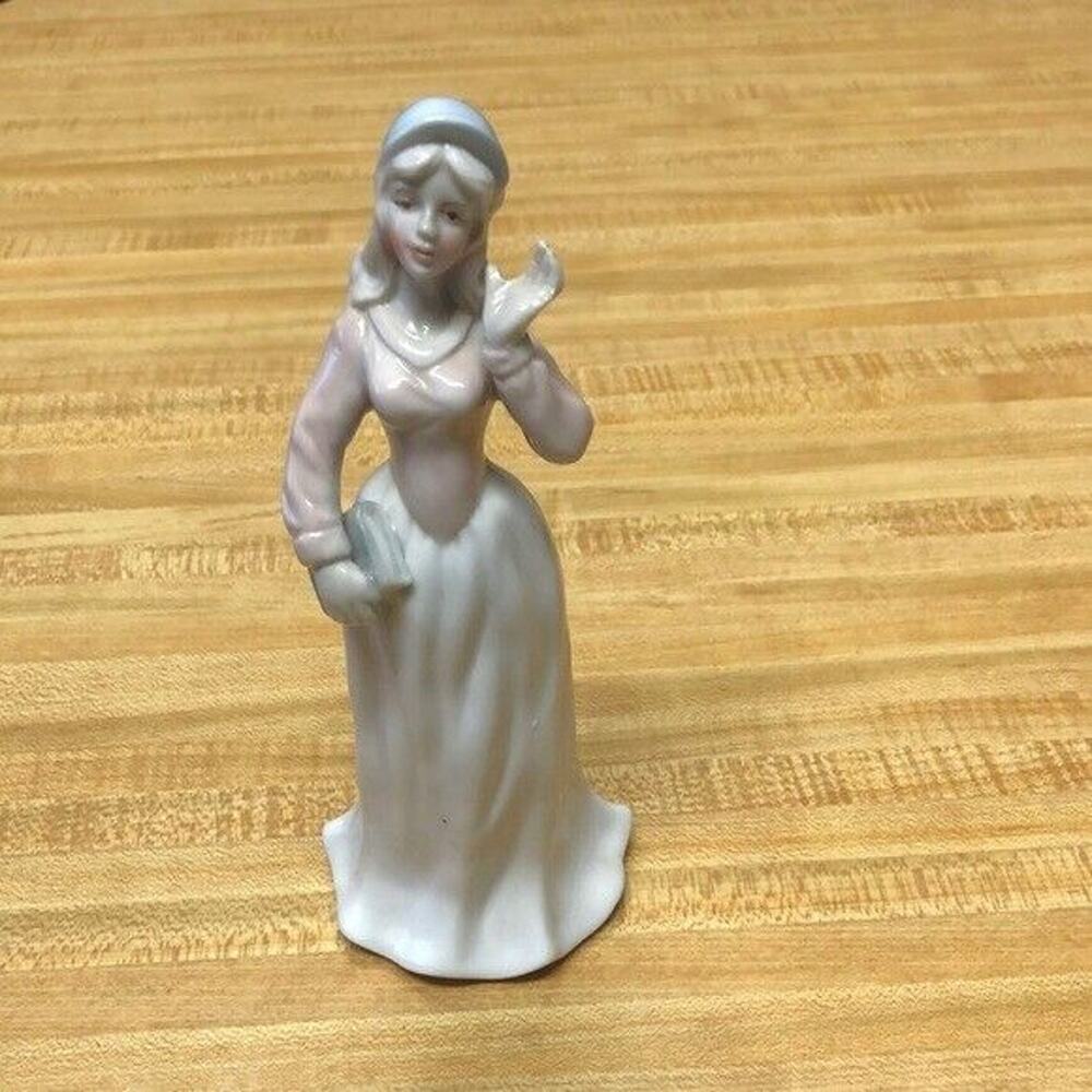 School girl long skirt carrying book glazed porcelain figurine home decor